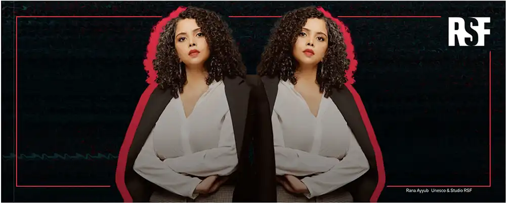 A mirrored image displays a woman with curly dark hair, wearing a white V-neck top and a dark blazer draped over her shoulders. She looks directly forward with a serious expression, her arms crossed. A vibrant pink outline frames her figure, set against a dark, textured background. The logos "RSF" and "Rana Ayyub, UNESCO & Studio RSF" are visible.